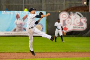 Baseball player throwing a ball.