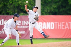A baseball player throwing a ball.