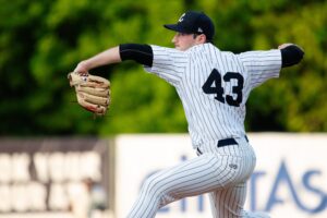 A baseball pitcher throwing a ball