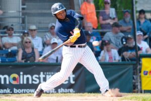 A baseball player swinging a bat.