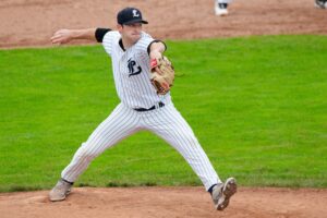 A baseball pitcher throwing a ball.