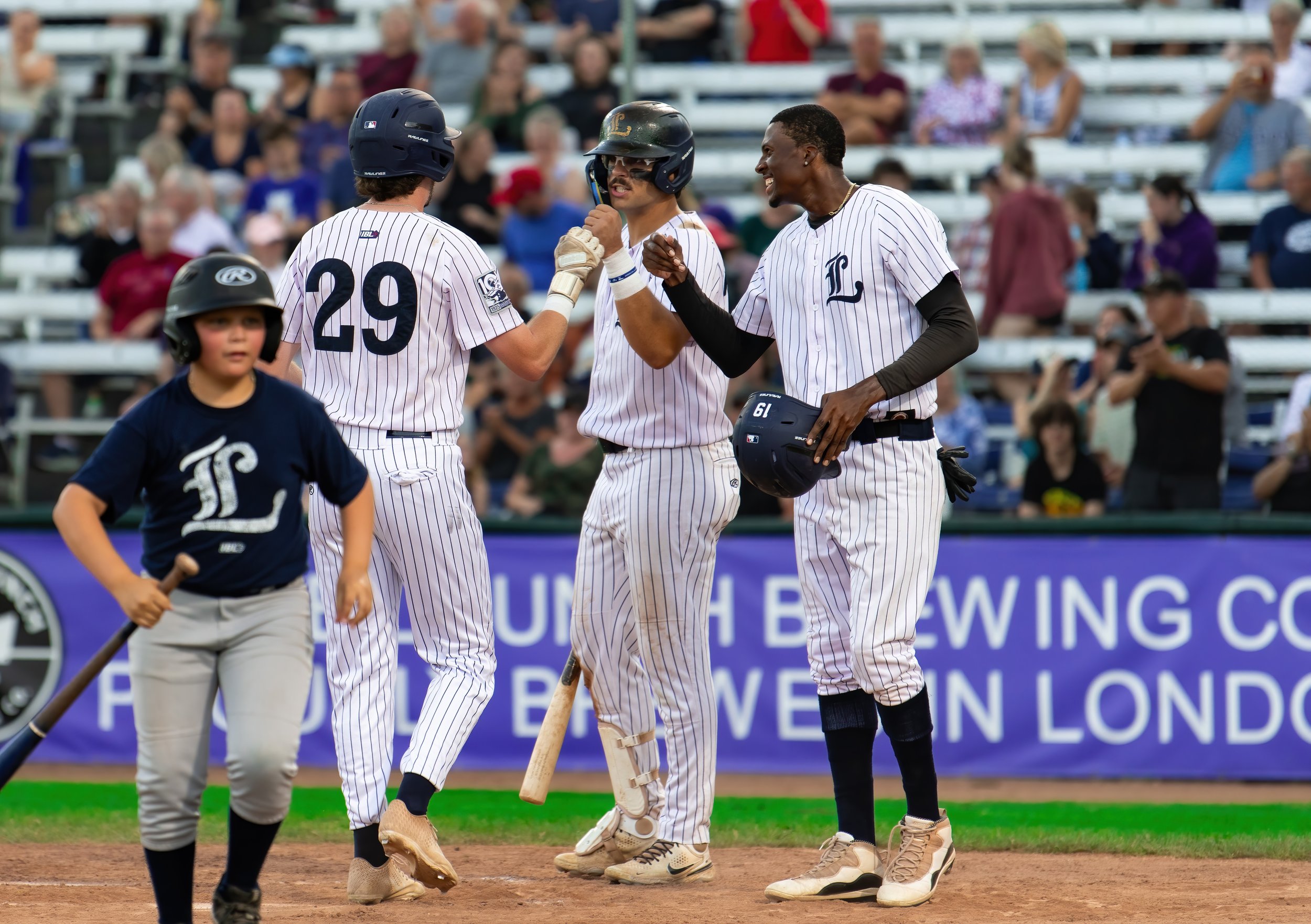 Baseball players together.