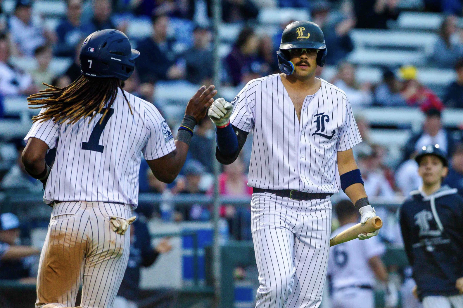 Baseball players running