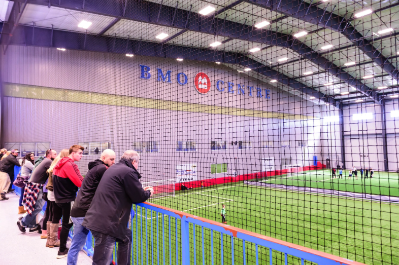 People watching an indoor soccer game